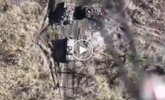 A Ukrainian drone drops incendiary ammunition on Russian military personnel in the Avdeevka area of the Donetsk region