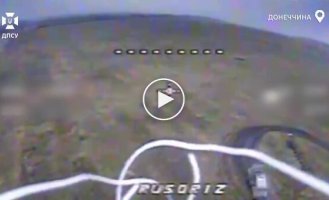 A drone destroys an enemy BM-21 GRAD MLRS