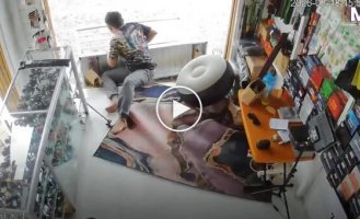 A store owner smashed a display window while trying to take a rest