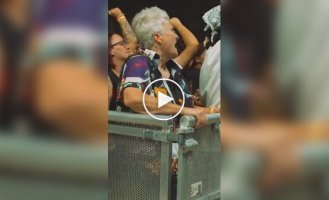 Grandma has a blast at the concert of her favorite band