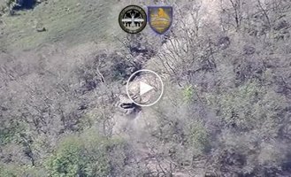 An enemy tank that crossed the border of Ukraine ran over a mine, tried to return to Russia and explodes after being hit by a kamikaze drone
