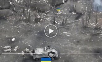 Ukrainian soldiers enter an enemy position and begin a battle with the invaders in the trenches