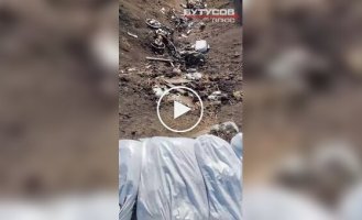 Smashed motorcycles and mutilated bodies of Russian invaders lie on the field after an unsuccessful assault