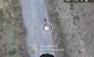 A Russian accidentally hits himself in the head while trying to hit a drone with a machine gun