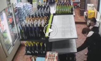 A shelf with expensive wine collapsed after the girls picked up a bottle