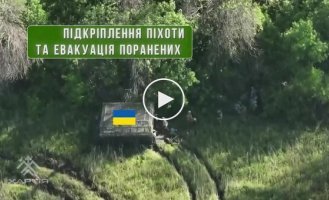 Ukrainian military, supported by armored vehicles, storm Russian positions near the village of Glubokoe in the Kharkov region