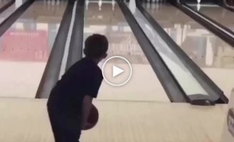 The boy passed the last level of bowling