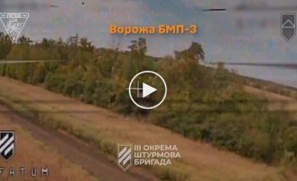 A Russian soldier jumps out of a KamAZ truck on the move to escape a suicide drone attack