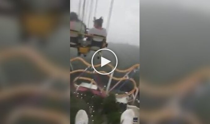 When the rain caught people on a stuck carousel