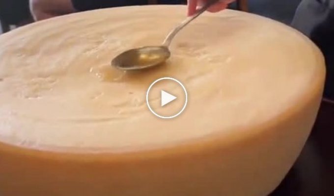 Cooking pasta on a wheel of parmesan