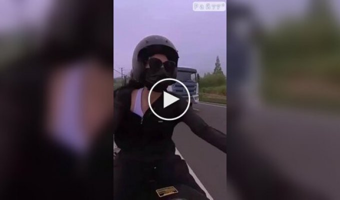 A motorcyclist miraculously dodged a chute flying off a concrete mixer