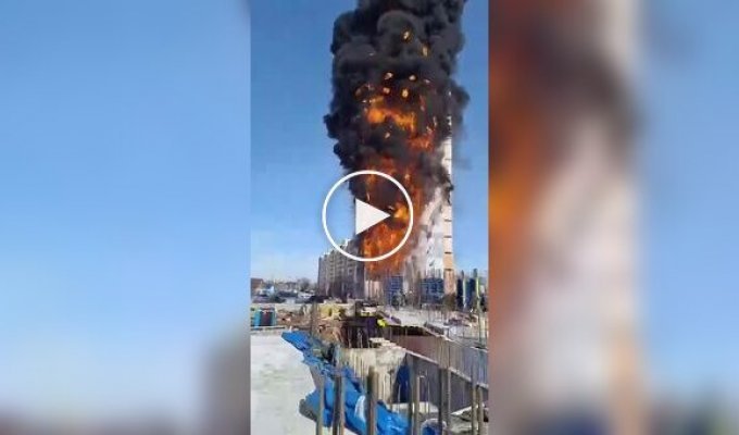 An unfinished high-rise building caught fire in an epic manner in Russia