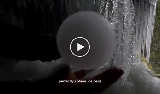 The waterfall creates almost perfect balls of ice
