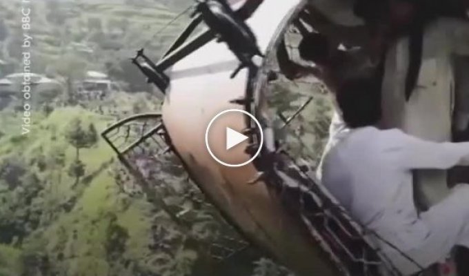 Six students and two teachers stuck on cable car in remote part of Pakistan