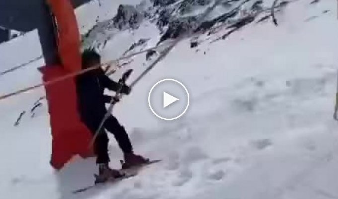 Skier on the ski lift and his failure