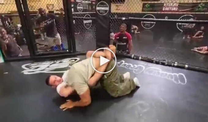 Bodybuilding power vs. MMA technique: Larry Wheels in the Octagon