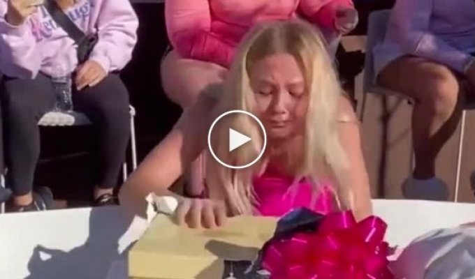 A very strange girl's reaction to a gift