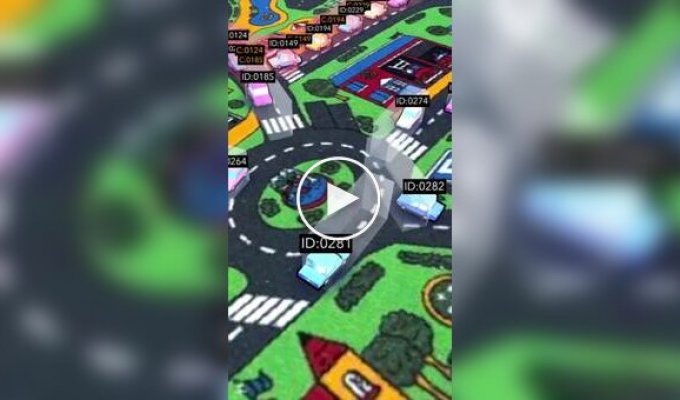 Augmented reality cars on a children's carpet with roads