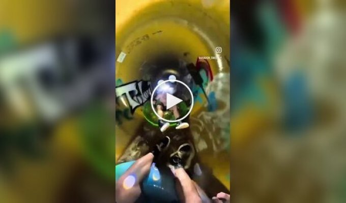 Riding inflatable rings through a storm drain