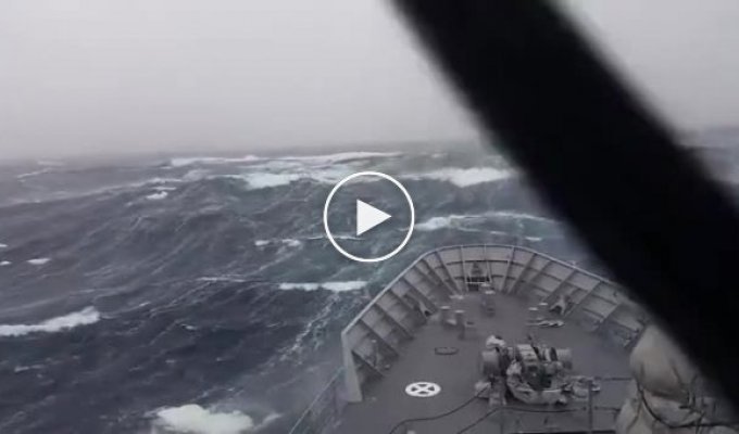 Beautiful shots. Ship passing through huge waves in a storm