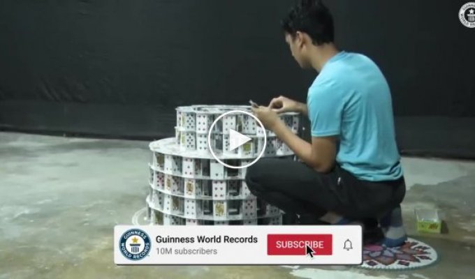 Patient schoolboy assembled a huge house of cards