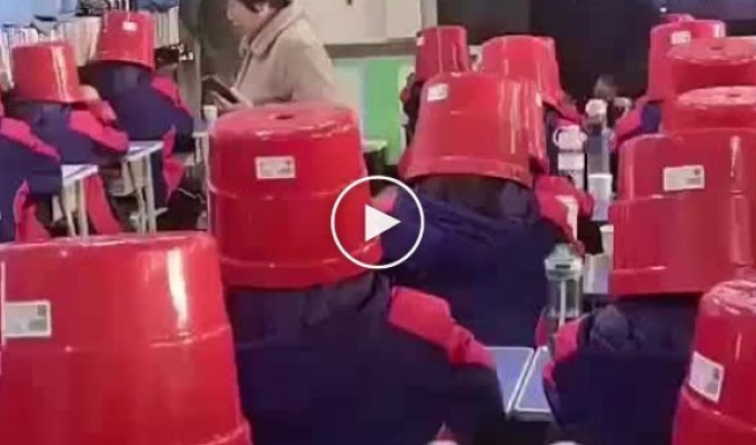 Parents did not immediately find their children taking exams with buckets on their heads