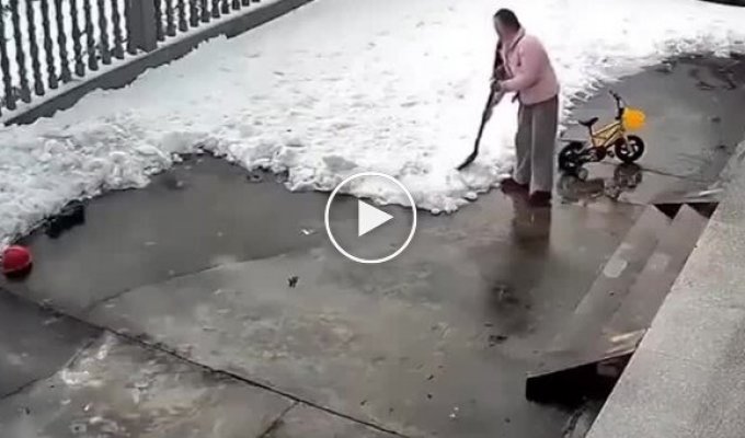 A woman was covered by a huge mass of snow