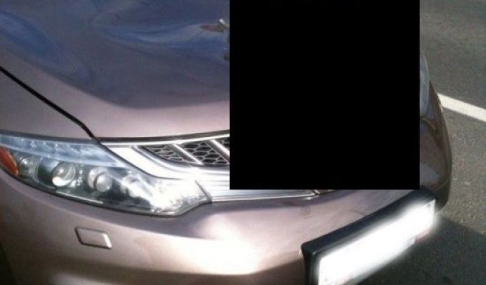 Суровое "послание" владельцу автомобиля (2 фото)