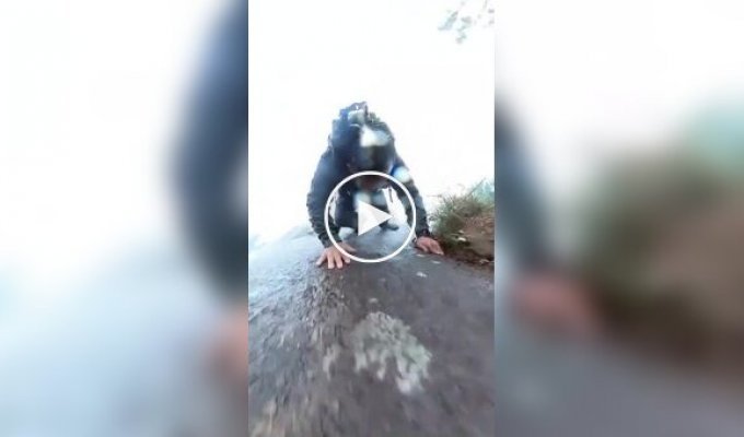 Chinese tourist's fall from a mountain caught on video