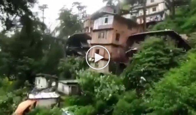 Landslides bring down houses and destroy infrastructure in India (quiet sound)
