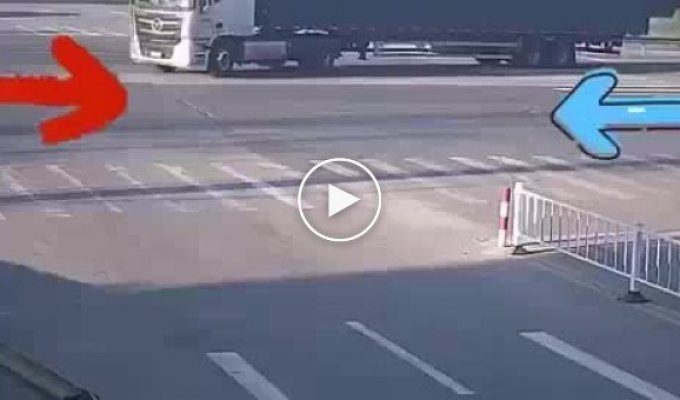 A container ship collided with a truck and flattened a car