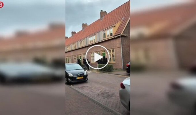 It looks like these police could use a master class in opening doors