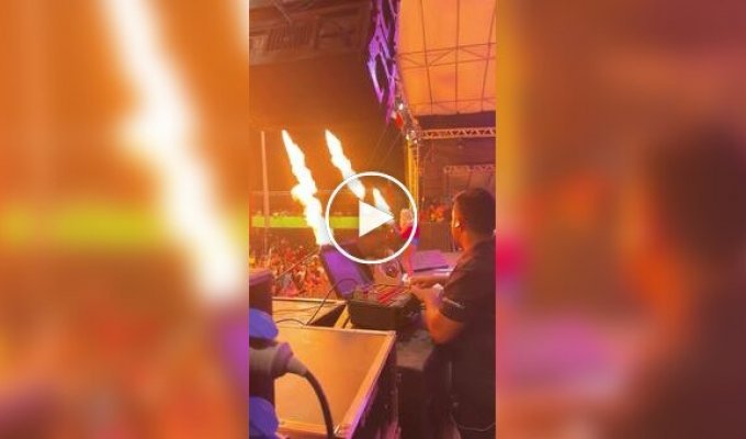 Pyrotechnician at work at a concert