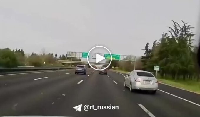 A car fell from an overpass onto a busy highway