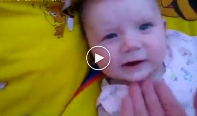 Funny baby teasing dad