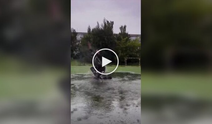 A young woman danced in the pouring rain
