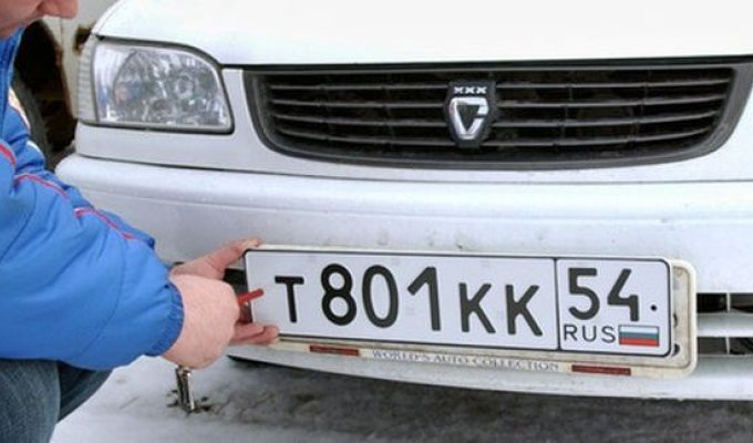 Как защитить номерной знак своего автомобиля от воров (9 фото)