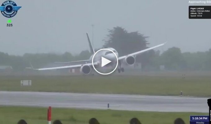 A plane almost touched the ground with its wing when it tried to land