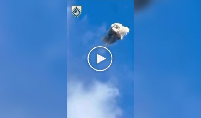An anti-aircraft missile hits a Russian Shahed attack drone