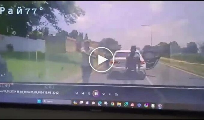 The driver outwitted the armed robbers and saved his life and car