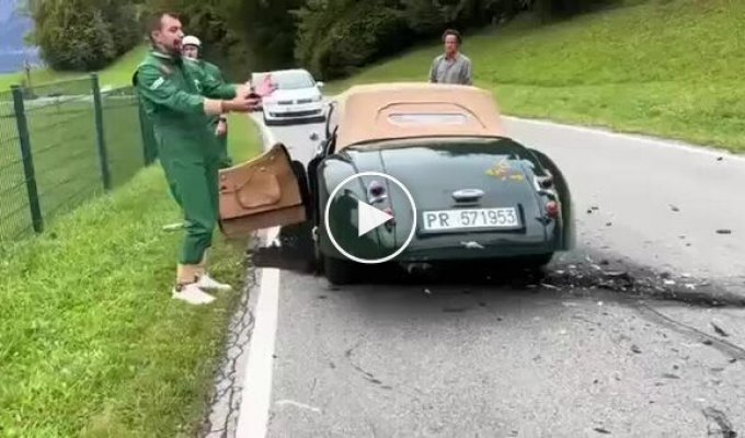 In England, a female driver got distracted and crashed into a 1948 Jaguar XK120