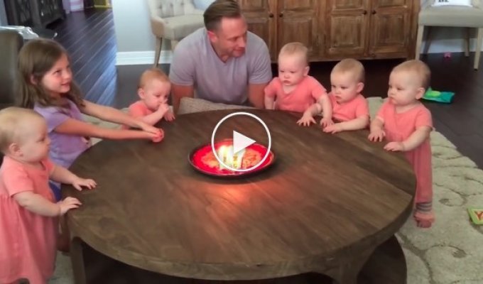 The father of 6 daughters blew out the candles on the cake. The kids' reaction is incredibly funny