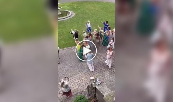 A child caught the bride's bouquet at a wedding