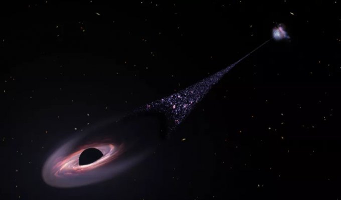 Ученые обнаружили комету с черной дырой в ядре и хвостом из звезд (2 фото)