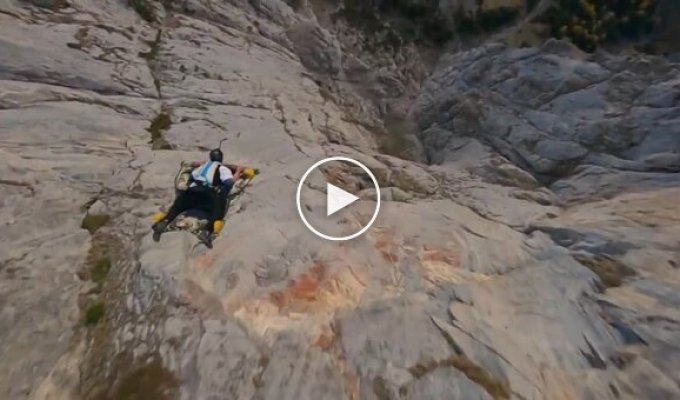 A man created a wingsuit in the shape of a flying carpet