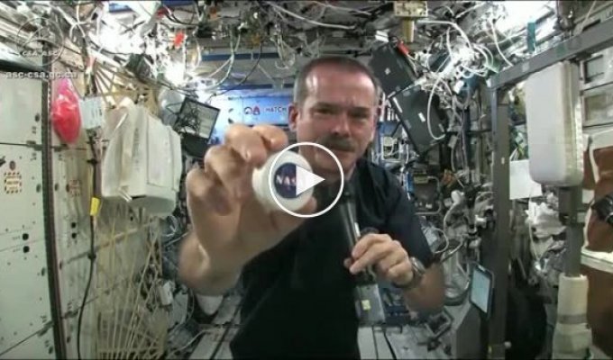 Wringing out a wet towel in space