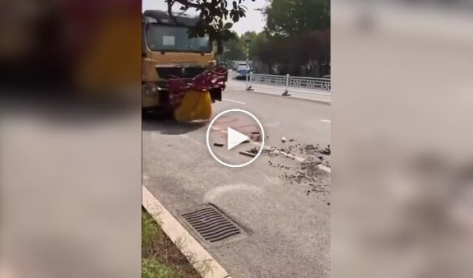 A machine for high-speed garbage collection from roads