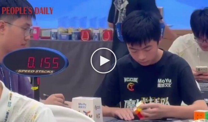 A teenager set a record for solving a Rubik's Cube with one hand