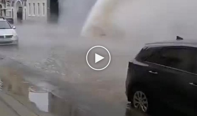 In St. Petersburg, a fountain of boiling water from underground floods houses and parked cars