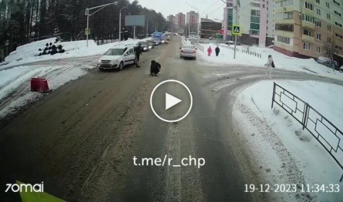 A driver hits a woman at a pedestrian crossing